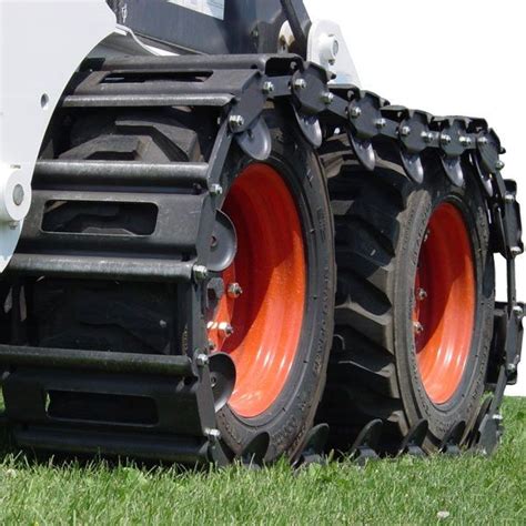 john deere 320 skid steer over the tire tracks|metal over tire skid steer.